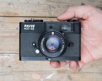 コニカ オート S3: ヘキサノン 38 mm f/1.8 レンズ搭載のブラック 35