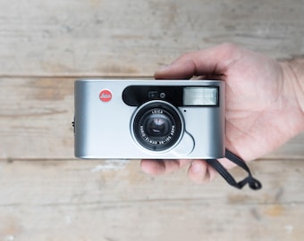 Leica C1 / 38-105 mm f/1.4-f/1.10,5 Leica Vario-Elmar Zoom Lens/ Silver 35mm Point and Shoot Camera / TESTED