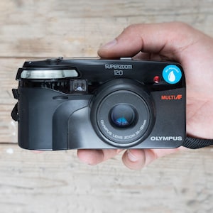 OLYMPUS 防水コンパクトフィルムカメラ 35-120mm Olympus Superzoom 120 / 35-120mm F4.5-8.7 Zoom Lens / Black 35mm