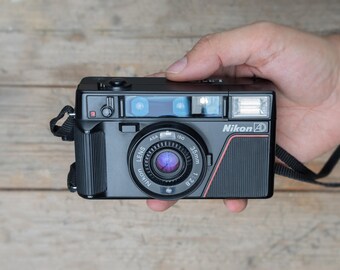 Nikon L35AD / Nikon L35AF / 35mm F/2.8 Lens / 35mm Point and Nikon L35AD / Nikon L35AF / 35mm F/2.8 Lens / 35mm Point and