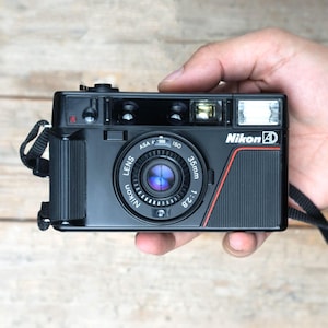 Nikon L35AD  / Nikon L35AF / 35mm f/2.8 lens /  35mm Point and Shoot Film Camera /  TESTED