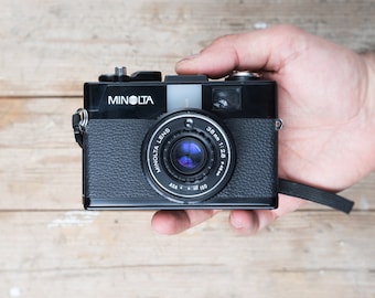 Minolta Hi-matic G2 / 38 mm f/2.8 lens / Black 35mm compact camera