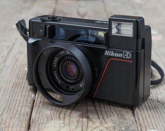 Nikon L35AD / Nikon L35AF / 35mm F/2.8 Lens / 35mm Point and Nikon L35AD / Nikon L35AF / 35mm F/2.8 Lens / 35mm Point and