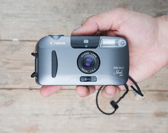 Canon Sure Shot Sleek: 32mm Point & Shoot Film Camera w/ Case