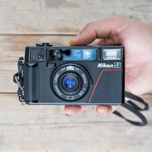 Nikon L35AD  / Nikon L35AF / 35mm f/2.8 lens /  35mm Point and Shoot Film Camera /  TESTED