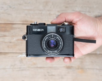 Minolta Hi-matic G2 / 38 mm f/2.8 lens / Black Zone Focus 35mm compact camera