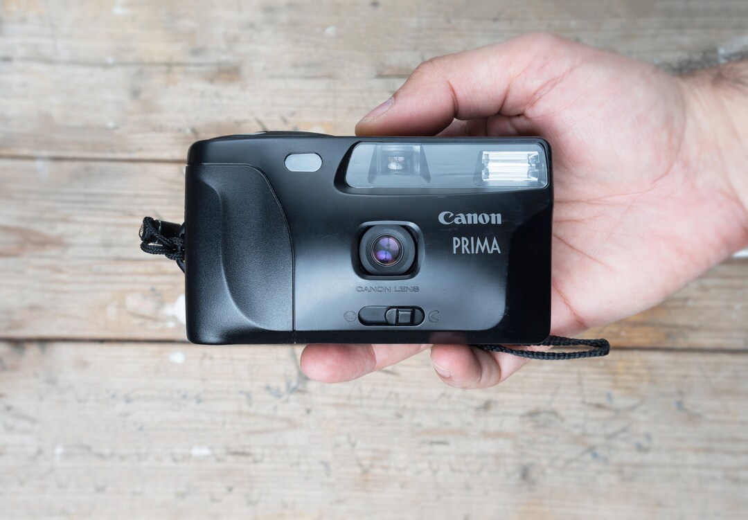 Fotocamera analogica CANON Prima Junior 35 mm. 1:3:8