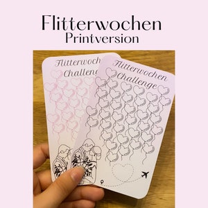 Pode incluir: Dois cartões imprimíveis com um design de balões em forma de coração. Os cartões são rotulados como "Flitterwoch Challenge" e mostram um casal de mãos dadas.