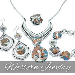 May include: A set of silver tone jewelry with turquoise and orange stone accents. The set includes a necklace, earrings, a ring, and a bracelet.