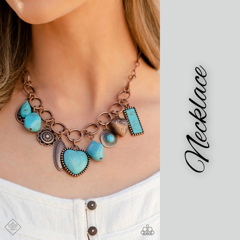 May include: A copper-toned necklace with turquoise stones and charms, including a heart, a flower, and a square. The necklace is on a white background with the word "Necklace" written in black.