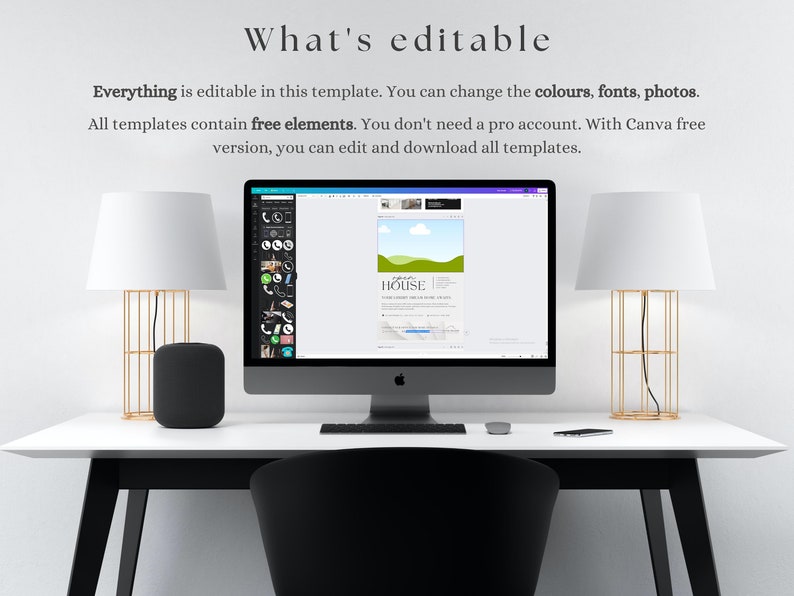 May include: A white desktop computer with a black screen displaying a Canva design template for a house. The template has a green lawn, a blue sky with white clouds, and the word "HOUSE" in black text. The computer is on a white desk with a black chair, a black speaker, and two gold lamps.