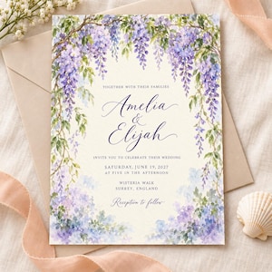 May include: A wedding invitation card featuring a watercolor illustration of hanging purple wisteria flowers. The text reads: Together with their families, Amelia & Elijah, invite you to celebrate their wedding, Saturday, June 19, 2027, at five in the afternoon, Wisteria Walk, Surrey, England, Reception to follow.