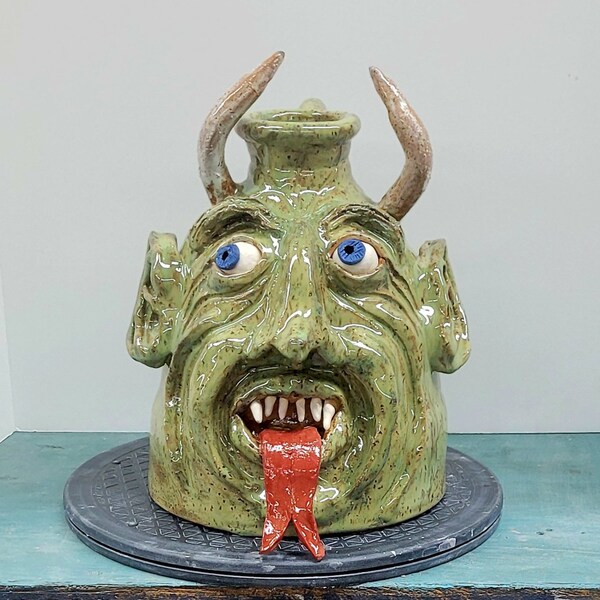 Southern folk art devil face jug