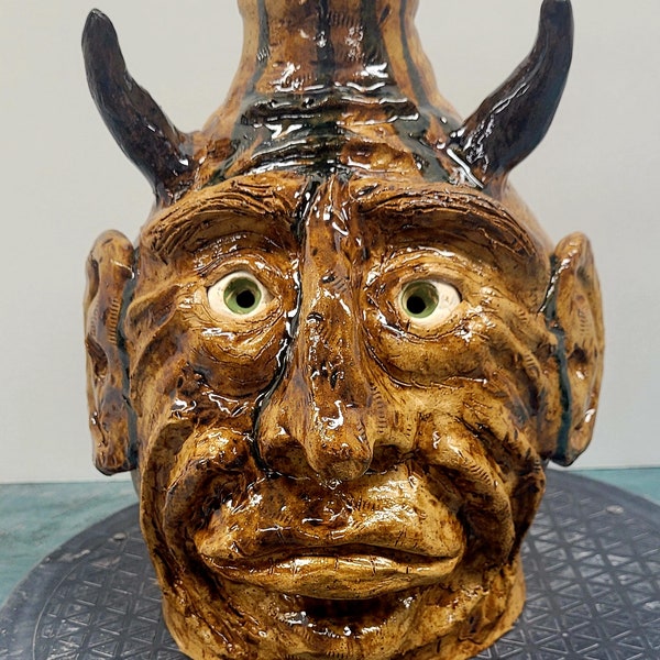 Southern folk art devil face jug