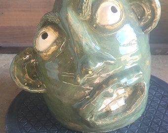 Southern folk art face jug