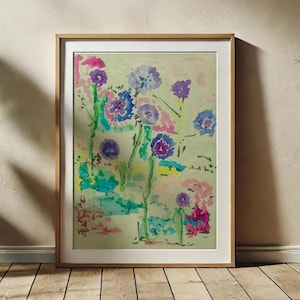 May include: A framed watercolour painting of a bouquet of purple, blue, and pink flowers with green stems on a light green background.