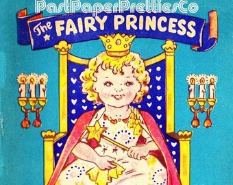 May include: A vintage paper doll set featuring a fairy princess in a pink and white dress with a crown and a wand. The princess is sitting on a throne with a black cat beside her. The text on the image reads "The Fairy Princess and Her Dresses".