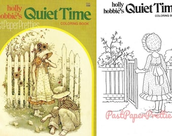 May include: A coloring book cover featuring a girl and boy in a garden setting. The cover is yellow with the title "Quiet Time" and the words "Holly Hobbie's Past Paper Pretties Coloring Book".