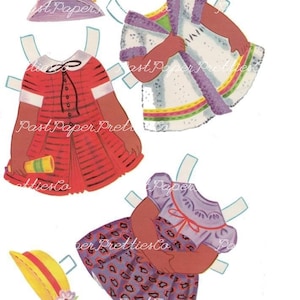 May include: A paper doll with different outfits. The doll has brown skin and is wearing a purple dress with a white collar and a red and white striped dress. The doll also has a purple hat with flowers and a yellow hat with a red band.