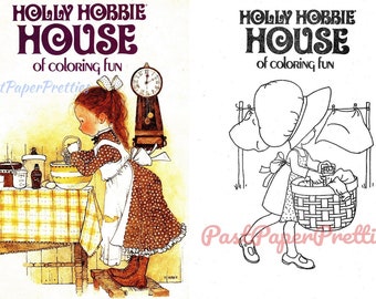 May include: A black and white coloring book cover featuring a girl in a dress and apron. The cover text reads "HOLLY HOBBIE HOUSE of COLORING FUN".