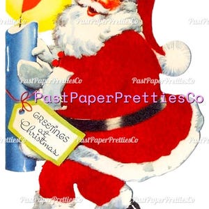 May include: A vintage-style illustration of Santa Claus wearing a red suit with white fur trim and black boots. Santa holds a tall blue candle with a bright yellow flame and a green gift tag that reads Greetings at Christmas.