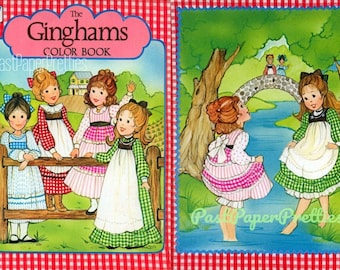 May include: A vintage coloring book titled "The Gingham's Color Book" featuring four girls in gingham dresses. The cover shows the girls standing by a fence, while the inside page shows two girls by a bridge over a stream.
