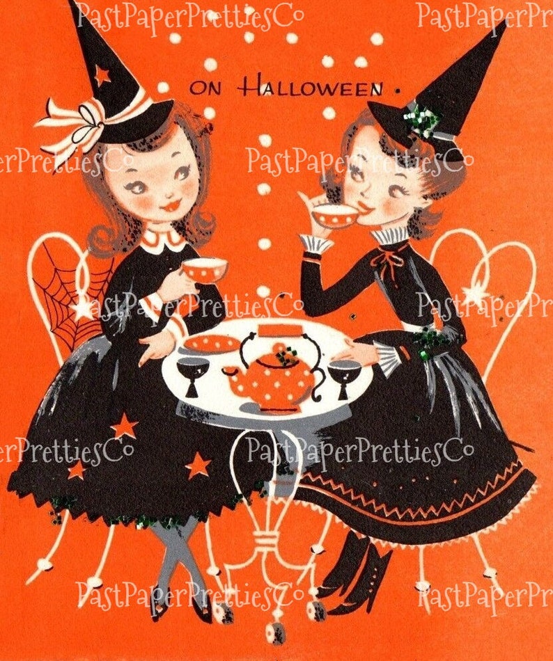 May include: Two witches dressed in black and white witch costumes with pointy hats are having tea on Halloween. The witches are sitting at a table with a teapot and teacups. The background is orange with white polka dots.