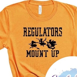 Regulators Mount Up Tee - Choose Size/Color Halloween, Spooky, Witch, Scary, Costume, Broom, Crazy, October, Song, Music, Pun, Lyric