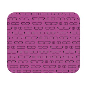 May include: A rectangular mousepad with rounded corners. The mousepad features a repeating pattern of black eyeglasses on a solid magenta background. The eyeglasses alternate between two different styles, creating a visually interesting design.