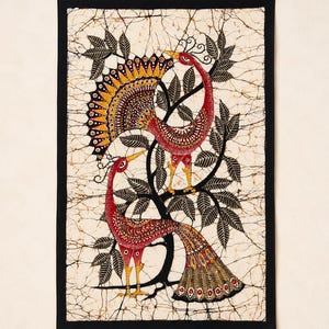 May include: A rectangular batik wall hanging featuring two stylized red peacocks with intricate yellow and black feather patterns perched on a black tree. The background is a cream color with a fine, dark brown crackle texture and a solid black border.