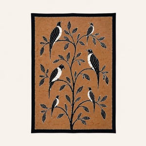 May include: A rectangular textile wall hanging featuring a brown background with a crackled texture. A central black tree with spreading branches holds five black and white birds. The entire design is framed by a solid black border.