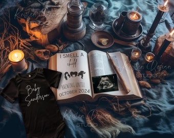May include: A black onesie with the text "Baby Sanderson" in white script. A book with the text "I smell a child... Brewing until October 2024" is open on a table with candles and other witchy decor.
