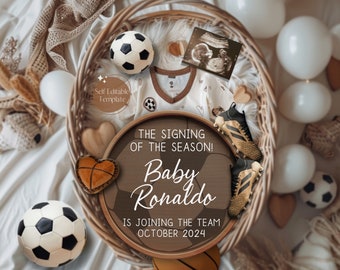May include: A brown wicker basket filled with baby items, including a soccer ball, a pair of baby shoes, and a sonogram image. The basket is decorated with a sign that reads "The Signing of the Season! Baby Ronaldo is joining the team October 2024."