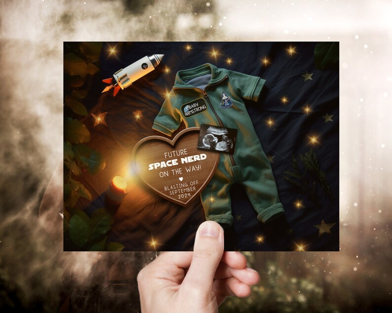 May include: A wooden heart-shaped sign with the text "Future Space Nerd On The Way! Blasting Off September 2024" and a small rocket ship and a baby onesie with a NASA patch.
