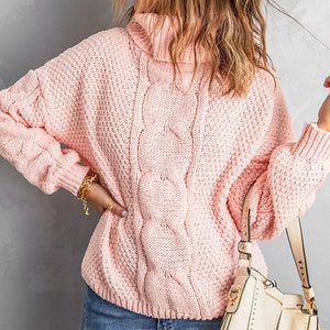 Blushing Cable Elegance: Pink Turtleneck Knit Sweater for Chic Comfort