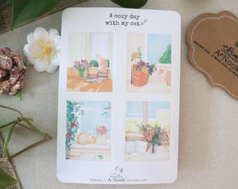 Könnte beinhalten: Ein weißer Aufkleberbogen mit dem Titel A cozy day with my cat, der vier verschiedene Illustrationen von Katzen in Innenräumen mit Blumen, Büchern und Fenstern zeigt. Die Designs enthalten sanfte Pastellfarben und detaillierte Szenen von Katzen.