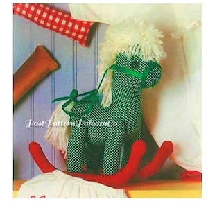May include: A green and white rocking horse toy with a white mane and tail. The horse is rocking on a red wooden base.