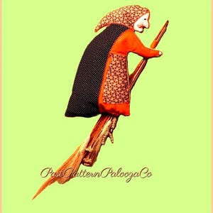 Puede incluir: Muñeca de bruja de tela hecha a mano montada en una escoba de madera. La bruja viste un vestido naranja con estampado floral, una capa negra de lunares y un gorro estampado. La imagen tiene el texto "Past Pattern Palooza Co".