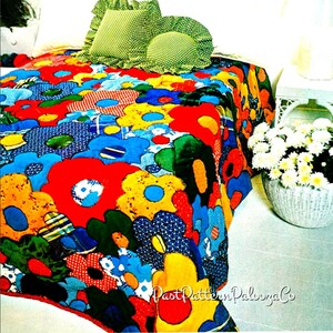 May include: A colorful bedspread with a large floral pattern in shades of red, yellow, blue, green, and white. The bedspread is made of a soft, plush fabric and features a variety of different flower shapes and sizes.