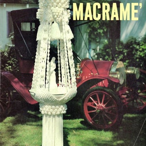 May include: A white macrame plant hanger with a bowl and tassels. The hanger is hanging from a ceiling hook and is in front of a red vintage car. The title "CLASSIC MACRAME'" is printed in yellow on a white background.
