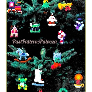 May include: A collection of colorful Christmas ornaments, including a train, Santa, snowman, rocking horse, and more, displayed on a Christmas tree. The ornaments are made of felt and other materials. The text "PastPatternsPalooza" is visible.