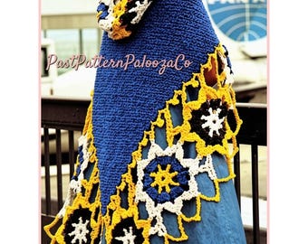 May include: A blue crocheted hooded cape with a decorative floral pattern in yellow, white, and black. The cape is worn over a denim dress. The text "PastPatternPaloozaCo" is visible.