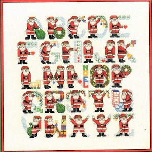 May include: A cross-stitch alphabet pattern featuring Father Christmas in various poses, each letter formed by his body and accessories. The letters are A, B, C, D, E, F, G, H, I, J, K, L, M, N, O, P, Q, R, S, T, U, V, W, X, Y, and Z.