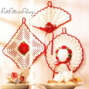May include: Three crocheted pot holders with red trim and white crochet. Each pot holder features a red rose with green leaves in the center. The text "Past Patterns Palooza" is visible in the top left corner of the image.