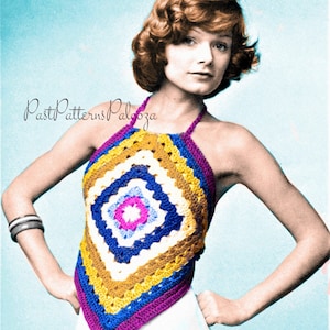 May include: A crocheted halter top with a diamond-shaped design in shades of purple, blue, yellow, and white. The top features a central flower motif.