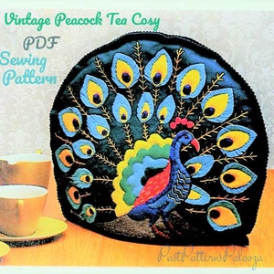 May include: Vintage PDF sewing pattern for a peacock tea cozy. The cozy is made of felt and features a colorful peacock design with blue, yellow, green, and red accents. The pattern is available for download.