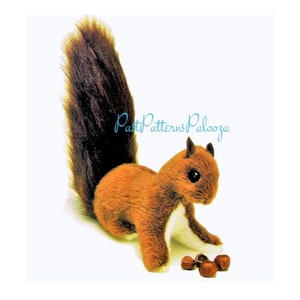 May include: A plush brown squirrel toy with a long bushy tail, sitting on a white background with a few brown nuts in front of it.
