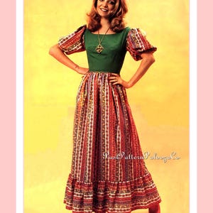 May include: A vintage maxi dress with a green bodice and patterned sleeves and skirt. The skirt features vertical stripes in red, white, and brown. The dress has a ruffled hem and is worn with red shoes. A gold necklace is visible.