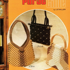 May include: An orange cover with the title "Purse Time" showcasing three macrame purse designs. The purses are in shades of brown, black, and cream, with wooden handles and decorative knots. The cover also includes the text "Cord Craft" and "Over 20 timely purse designs."
