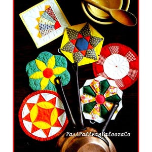 May include: A collection of colorful, quilted pot holders in various geometric and floral designs. The pot holders feature red, yellow, green, and blue patterns. A copper pot, wooden spoon, and bowl are also visible. The text "PastPatternPaloozaCo" is in the image.